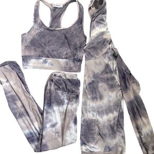 Purple tie dye 3 piece set. The brand is Ara Sports . The size is S.